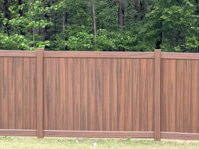 Low-maintenance wood-grain vinyl privacy fence