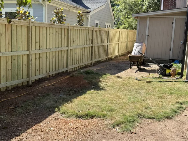 Wood privacy fence around a finished backyard in Upstate SC